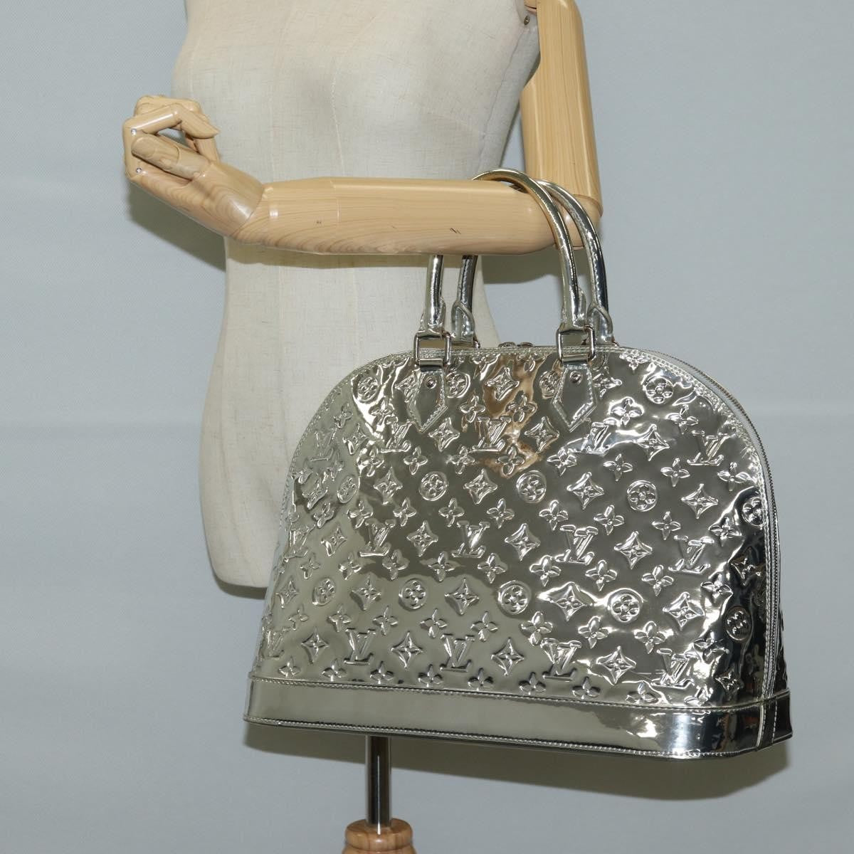 LOUIS VUITTON モノグラム　シルバー　Lサイズ Louis Vuitton Silver Monogram Miroir Alma GM | The Luxury Pear
