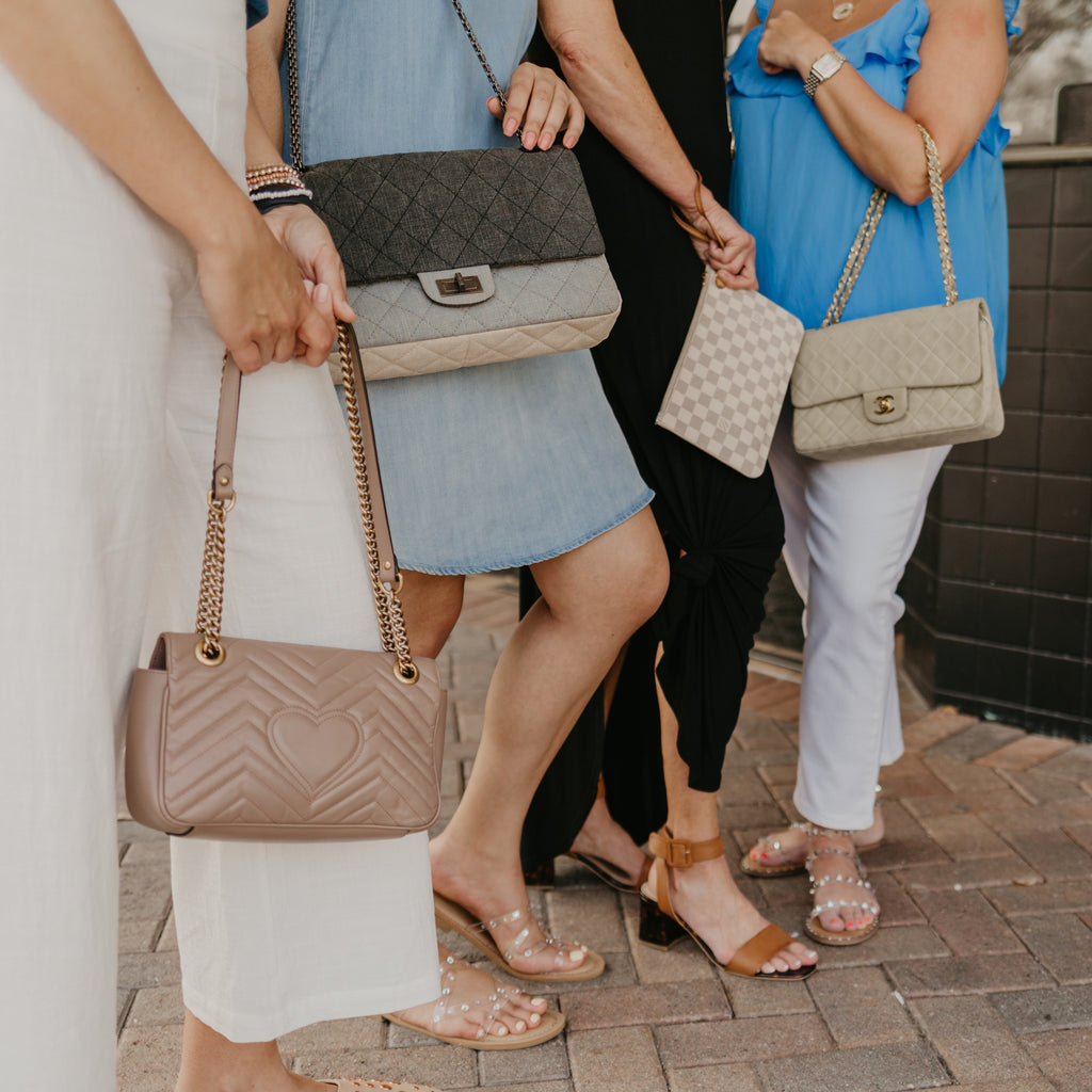 The Luxury Pear Luxury Handbags four women wearing luxury handbags chanel, gucci, prada