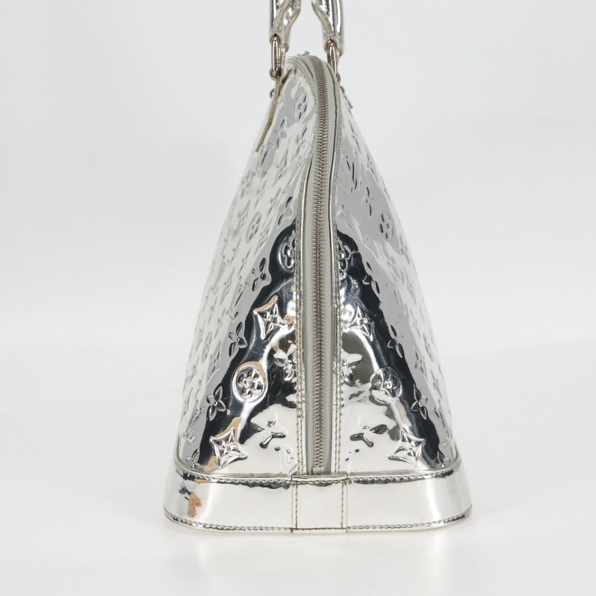 Louis Vuitton Silver Monogram Miroir Alma GM | The Luxury Pear